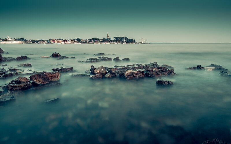 Coastal town with rocky shore