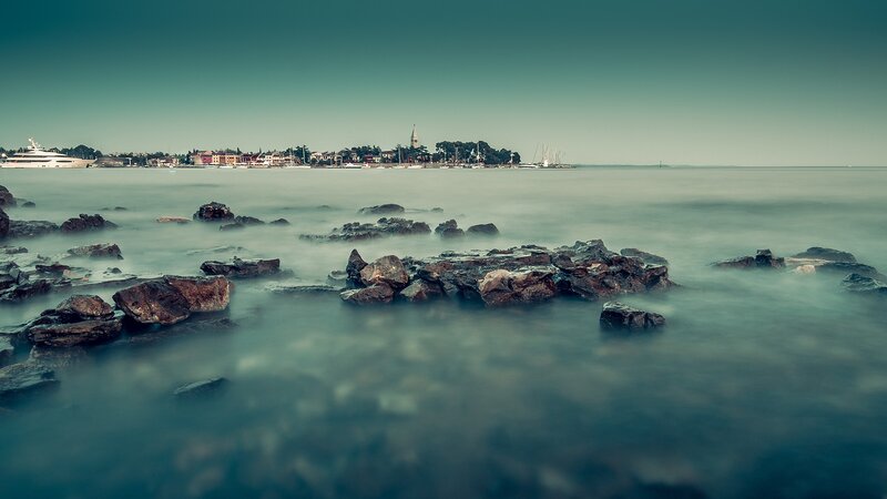 Coastal town with rocky shore