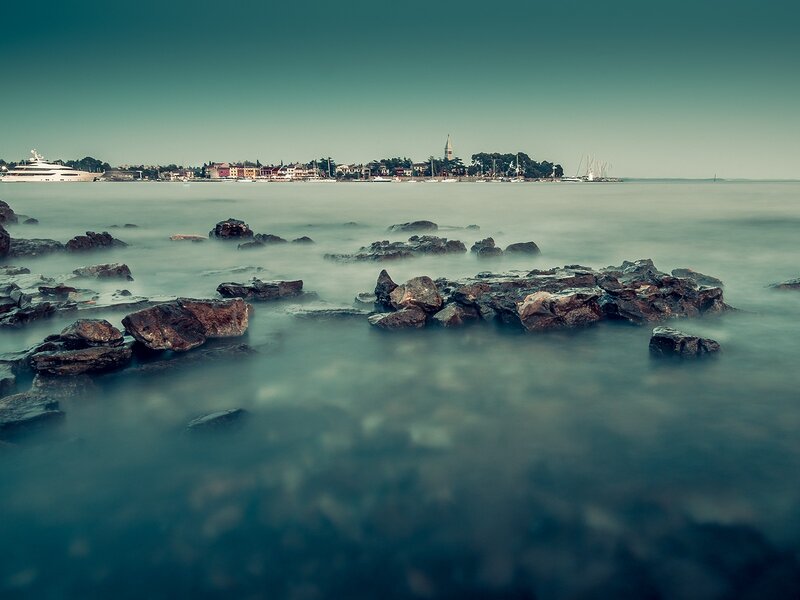 Coastal town with rocky shore