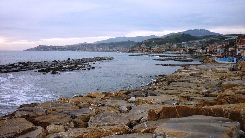 Coastal Town with Rocky Shore — Blue, Calm