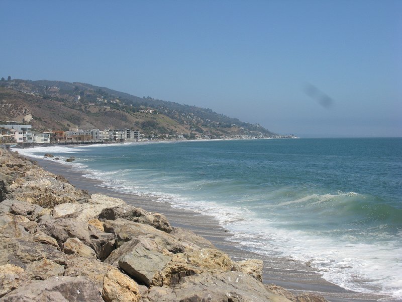 Coastal Town with Rocky Shore — Blue