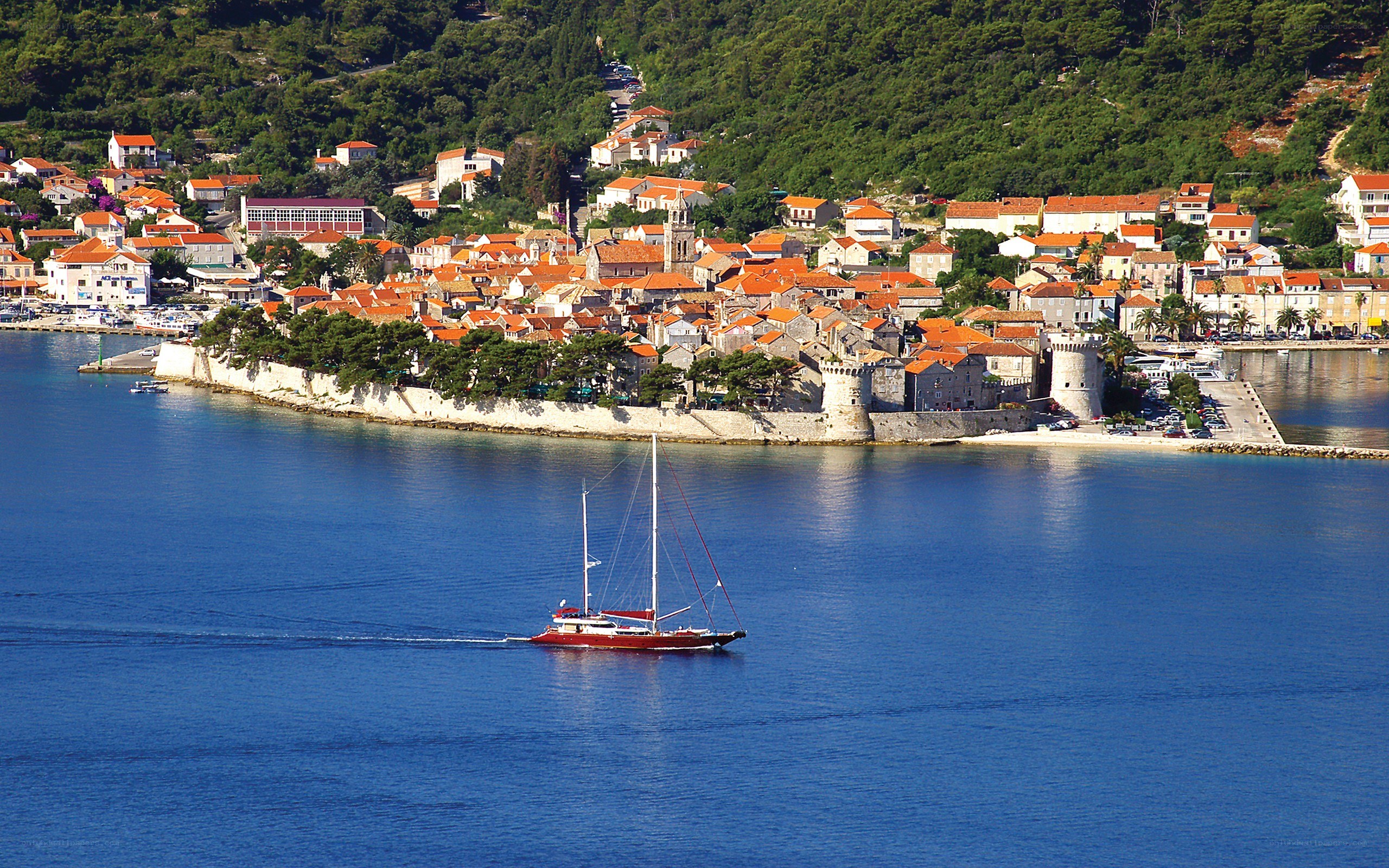 Coastal town with sailboat