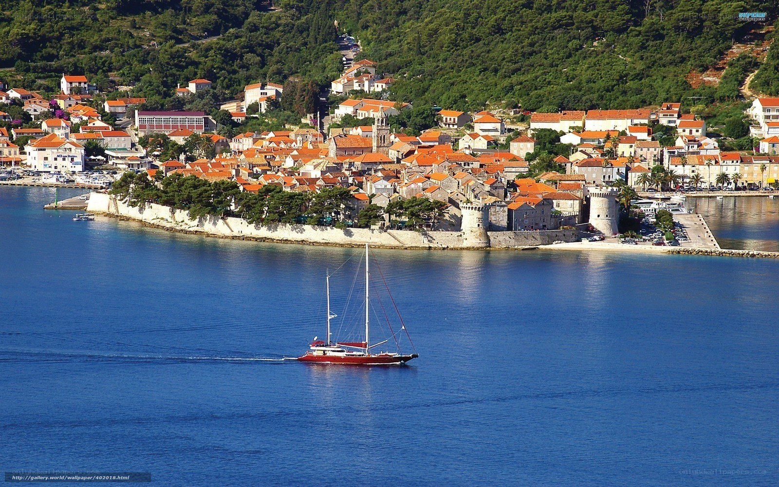 Coastal town with sailboat
