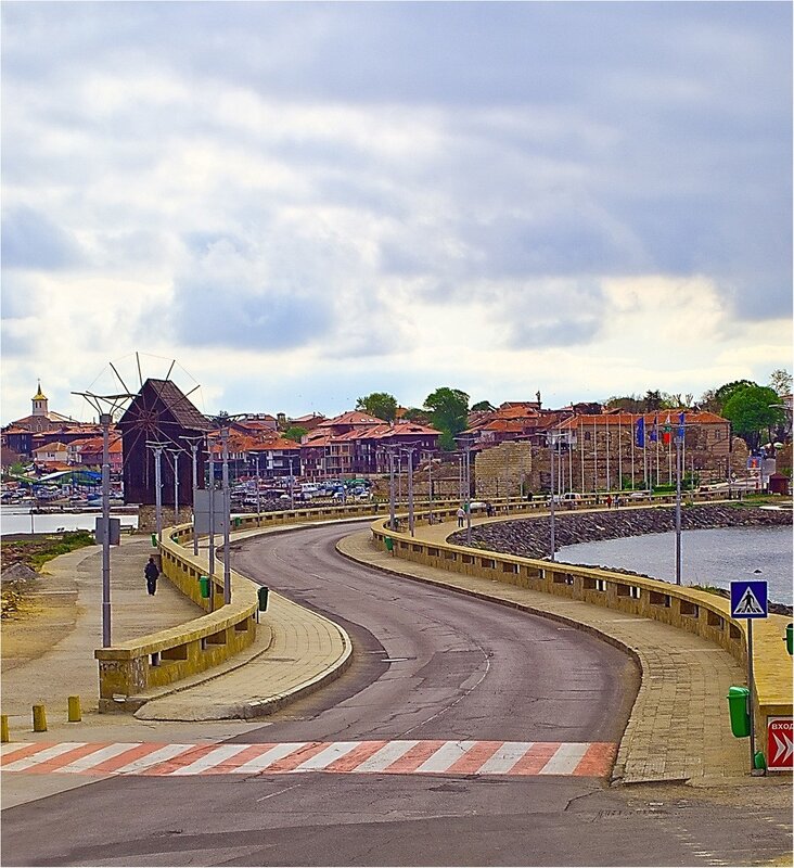 Coastal town with windmill
