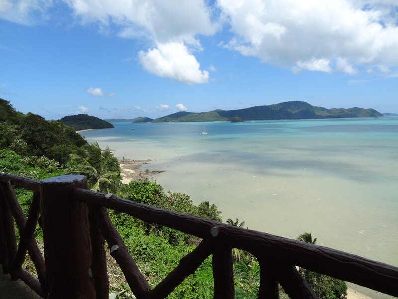 Coastal view from a wooden balcony