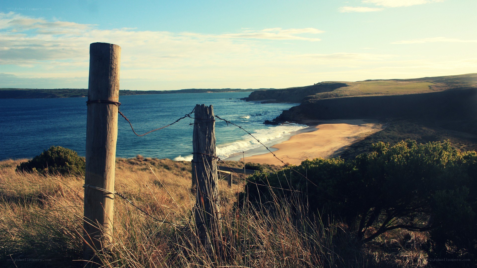 coastal view with barbed wire fence