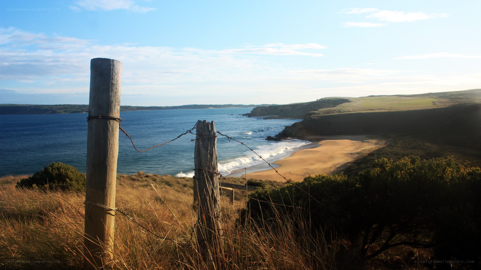 Coastal view with barbed wire fence
