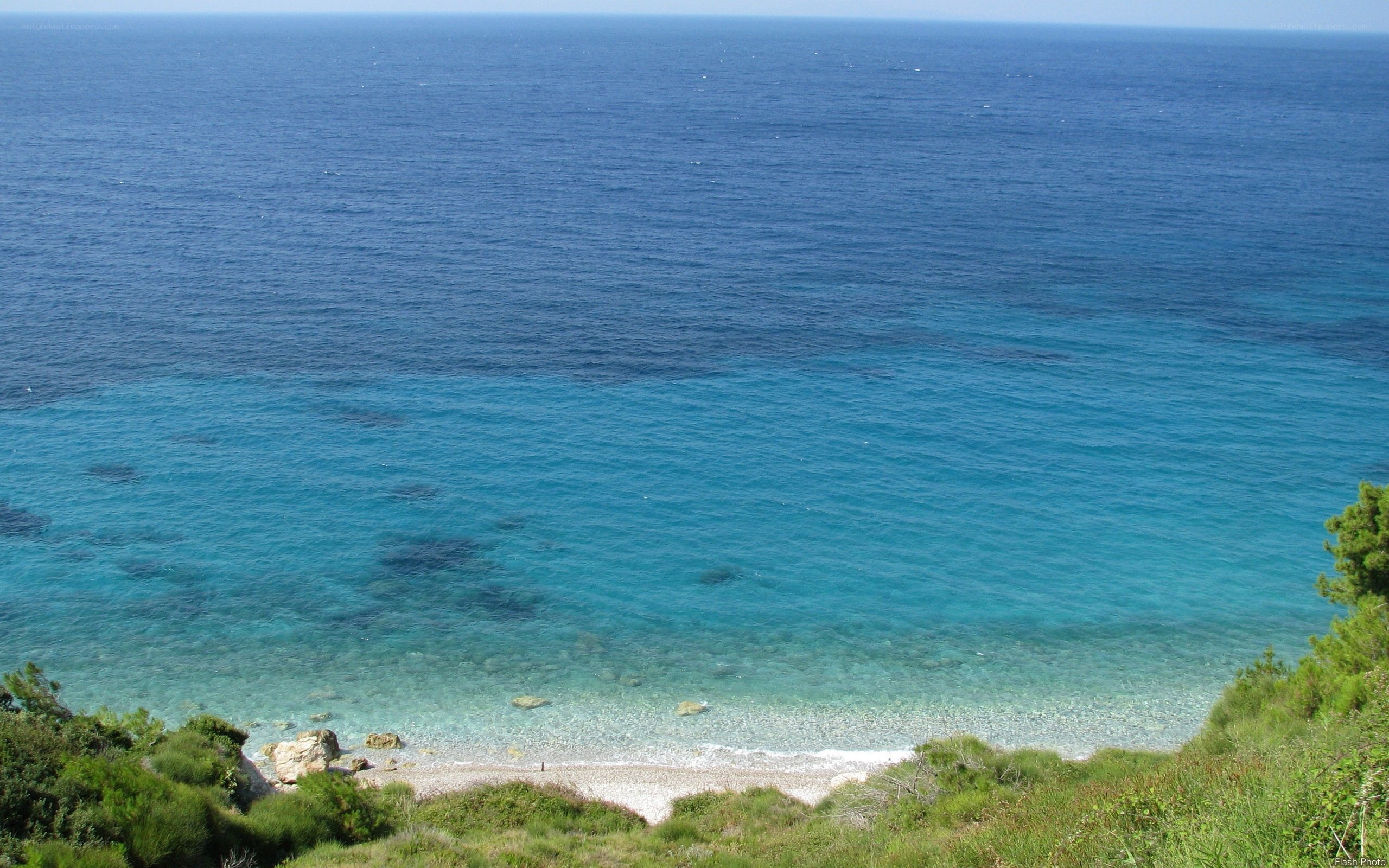 coastal view with clear blue water
