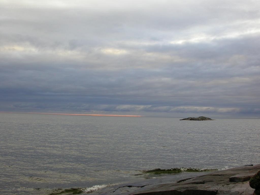 coastal view with distant island