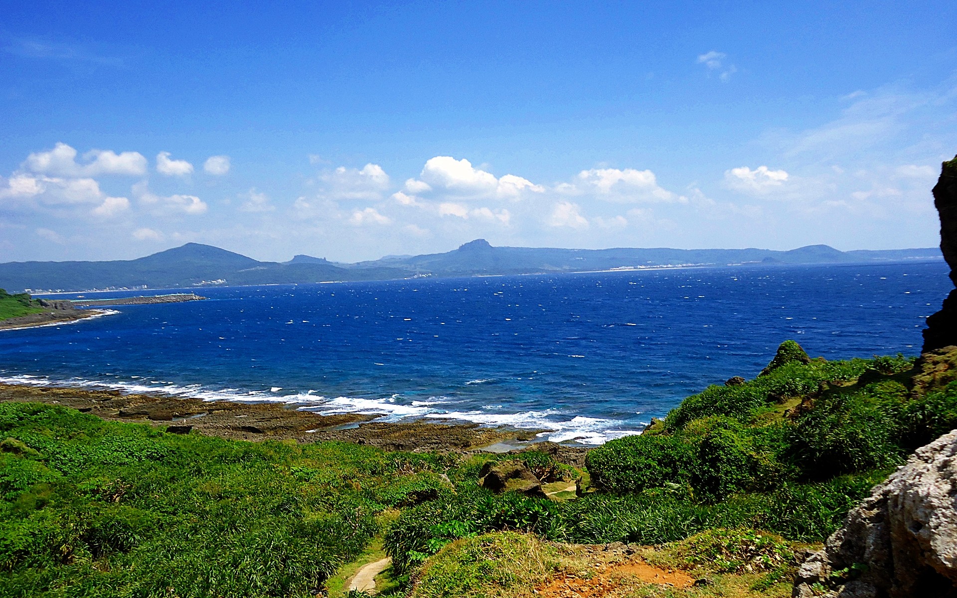 coastal view with distant islands