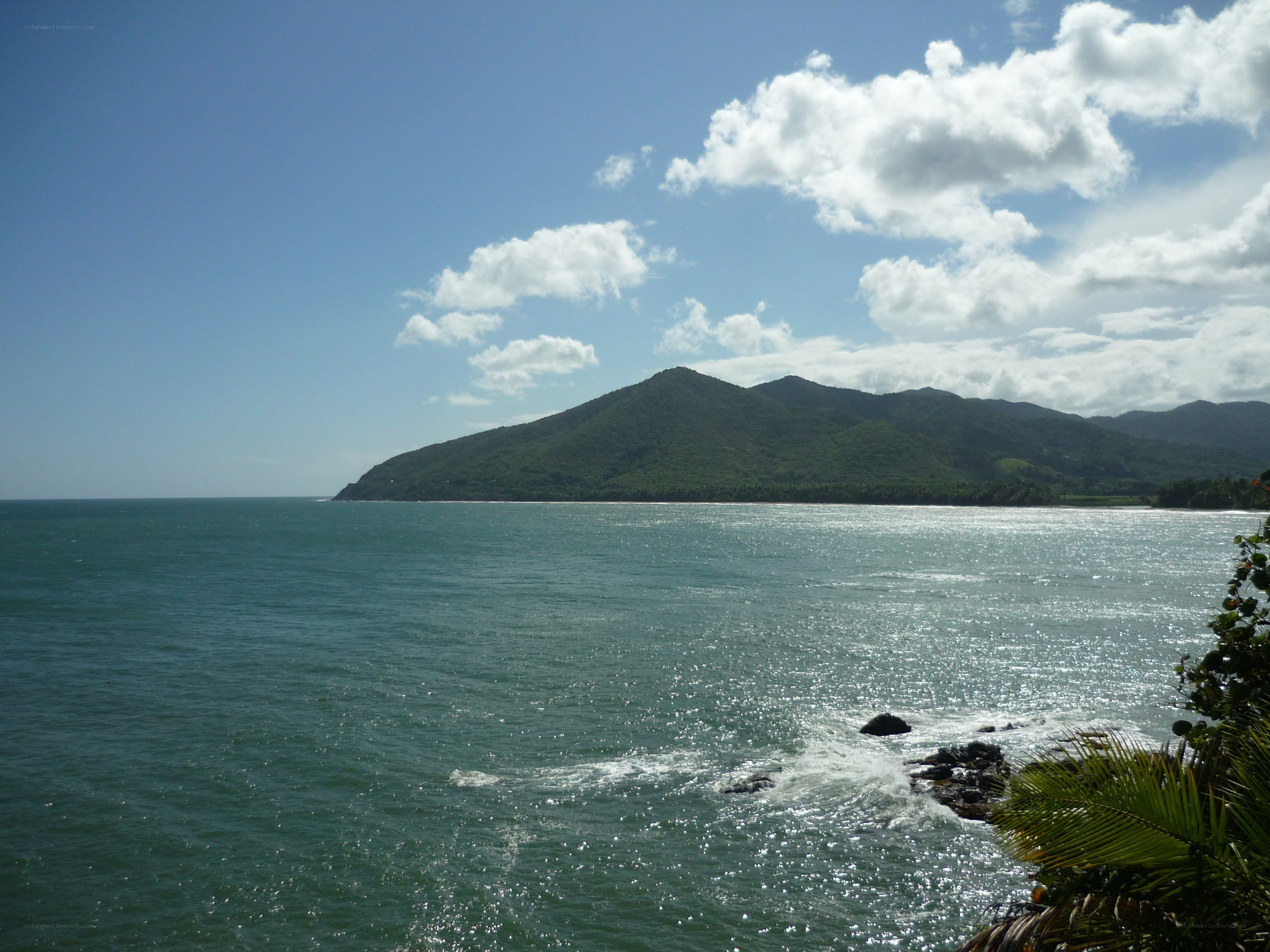 coastal view with green hills