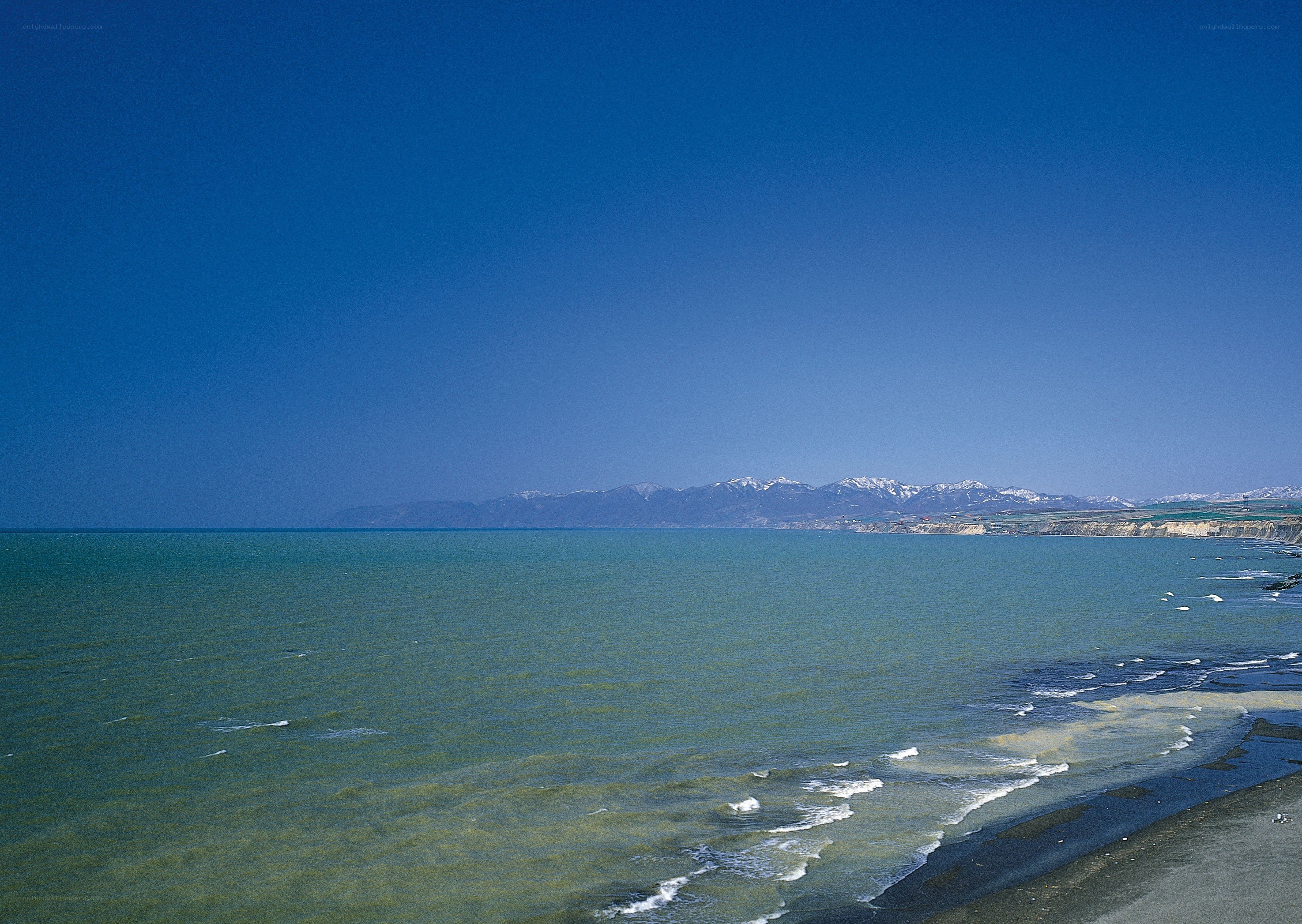 coastal view with mountains
