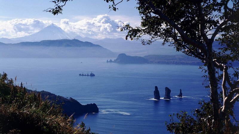 Coastal view with volcanic mountains