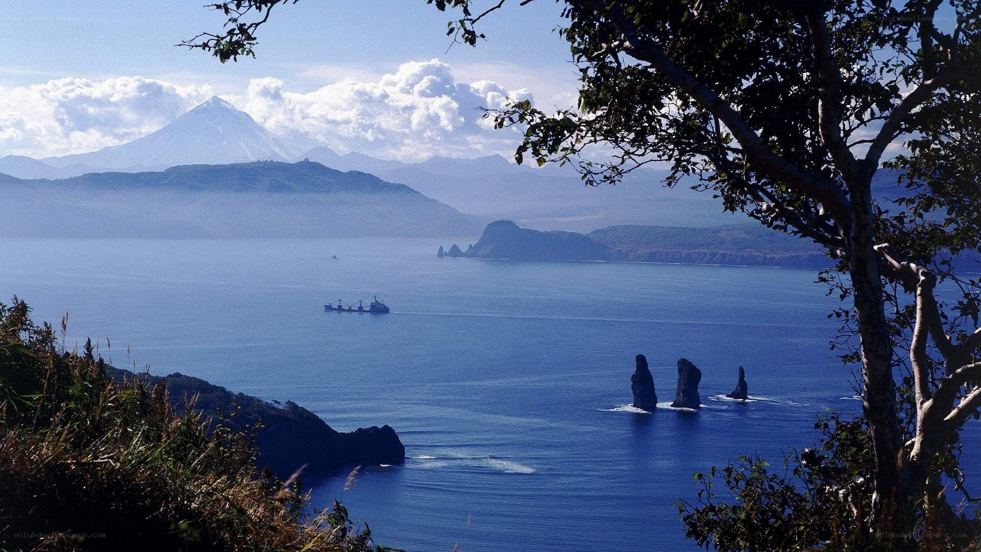 Coastal view with volcanic mountains