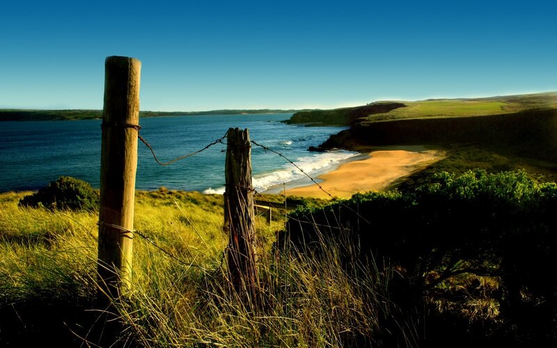 Coastal view with wooden fence