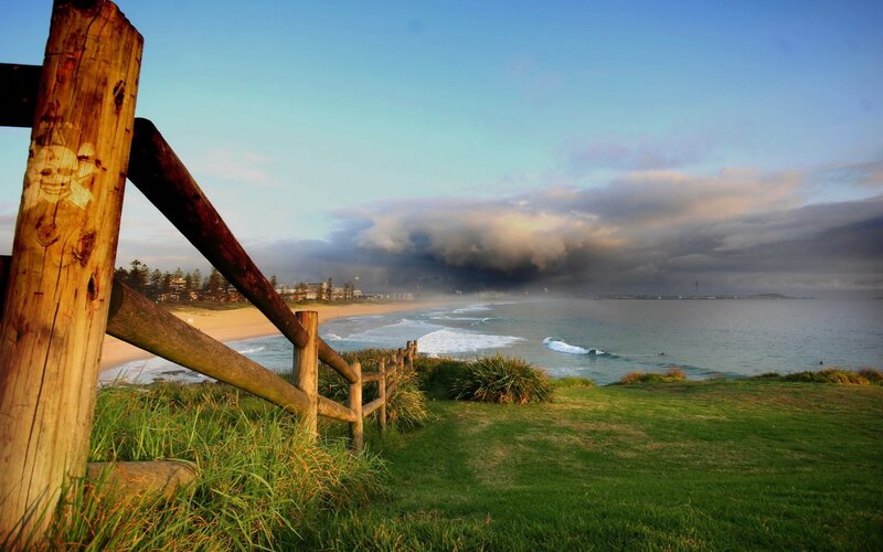 Coastal view with wooden fence