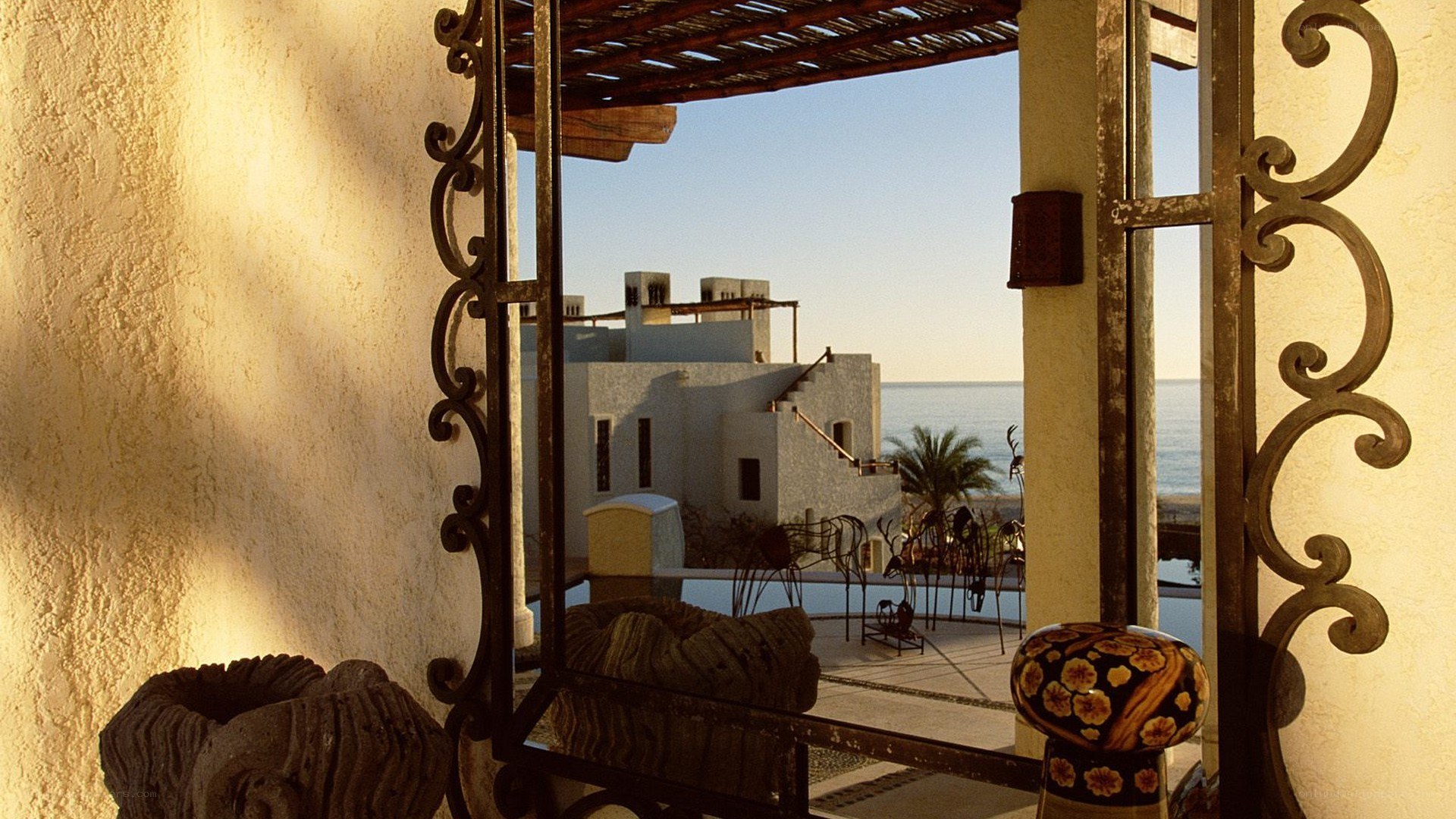 Coastal villa view through mirror