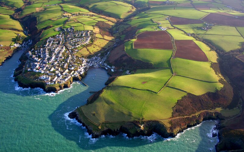 Coastal Village and Fields — Green, Serene, Afternoon