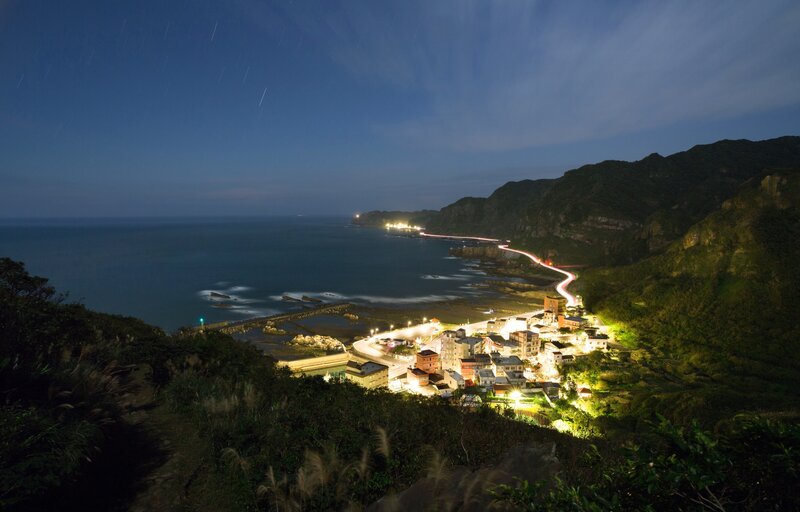 Coastal Village at Night — Blue, Serene, Photograph, Ocean