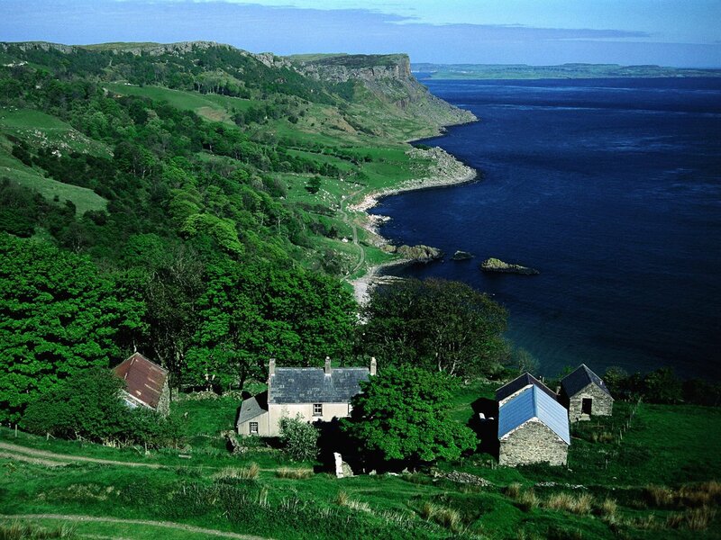 Coastal village on a green cliff