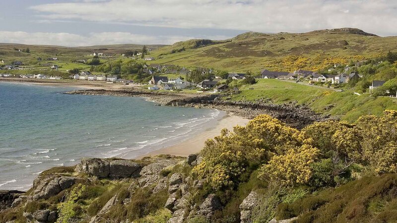 coastal village on a green hillside
