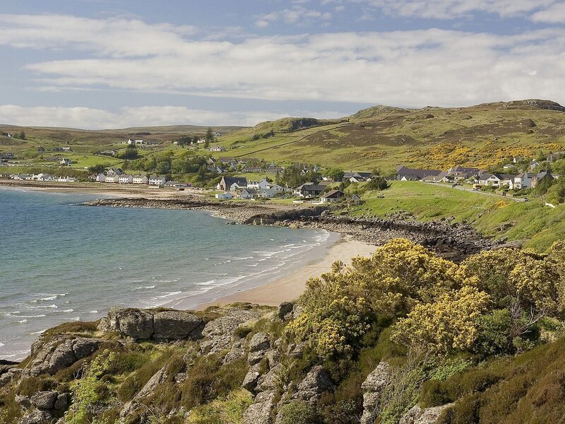 coastal village on a green hillside