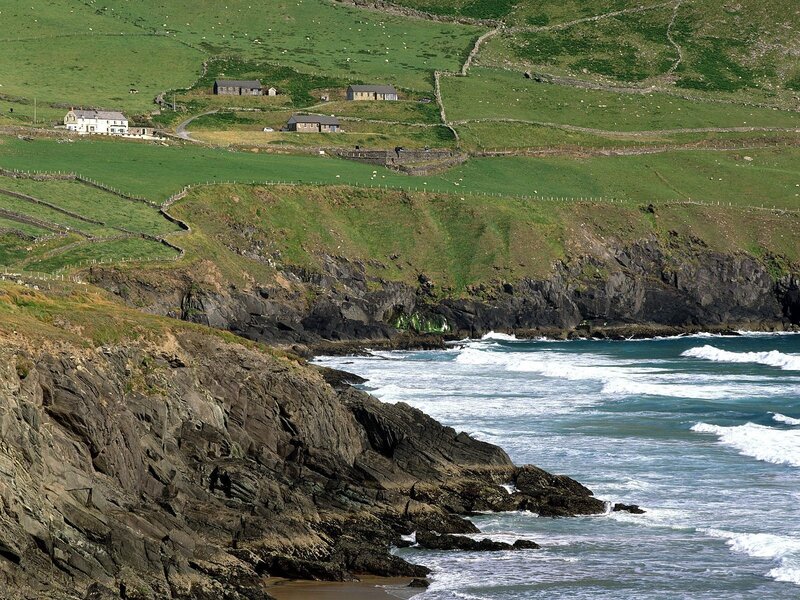 Coastal village on green hills