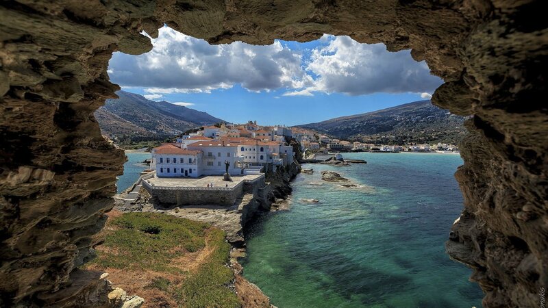 Coastal Village Through Cave