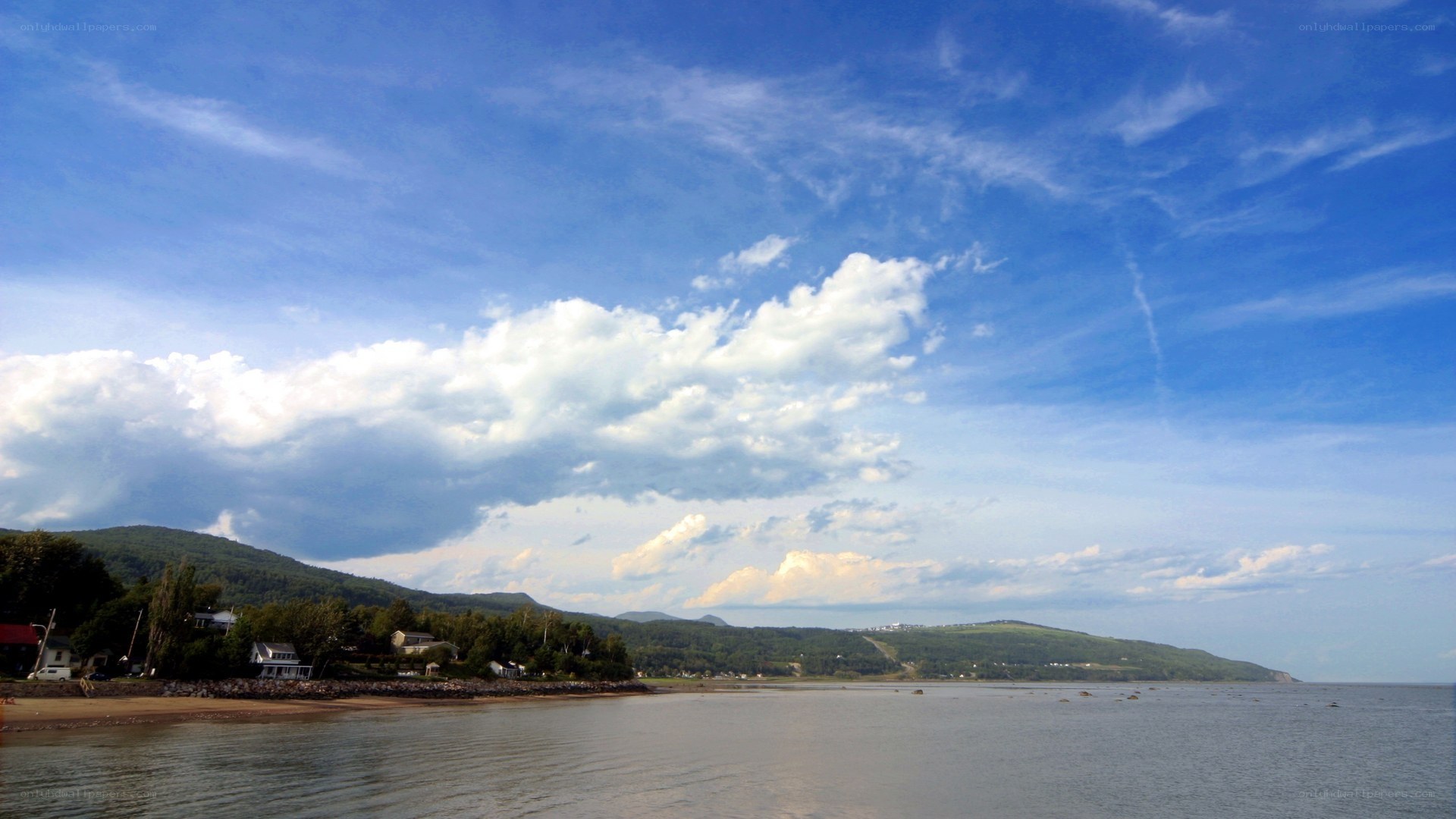 Coastal village under blue sky