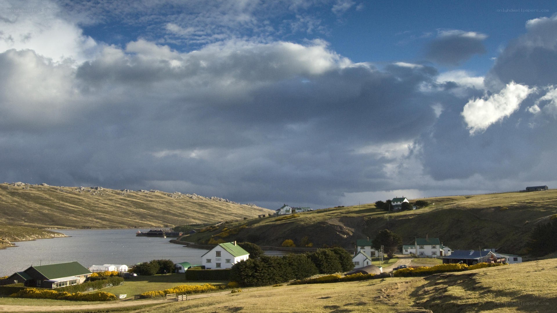 coastal village under cloudy sky
