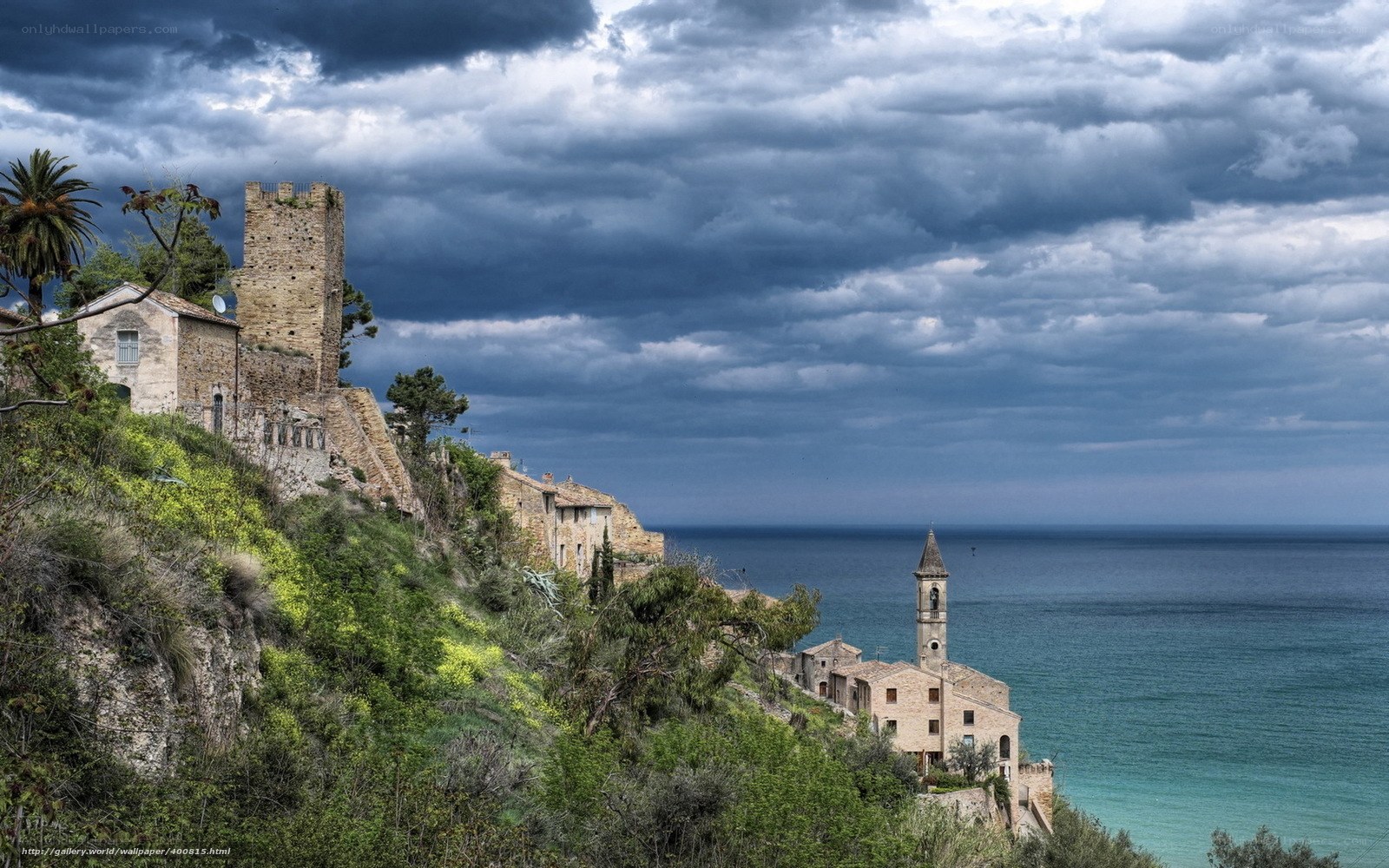 Coastal village under stormy sky