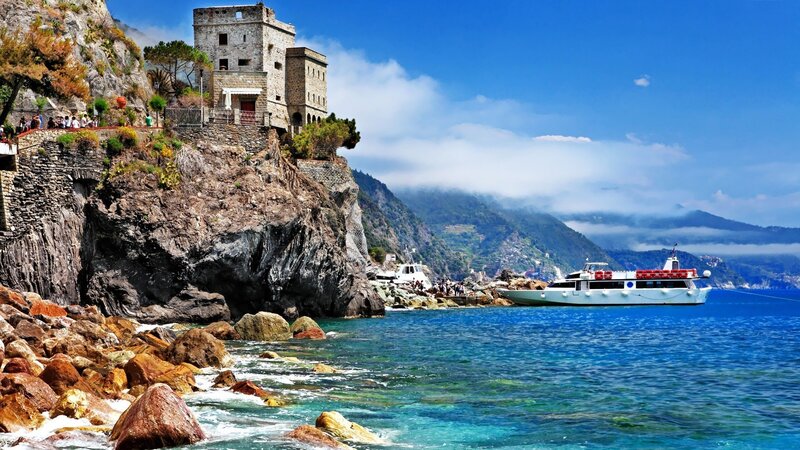 Coastal village with boat and castle