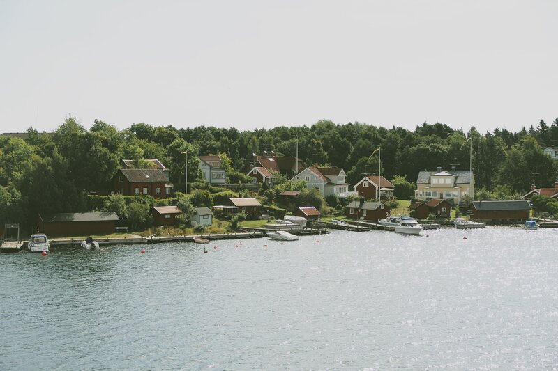 Coastal village with boats and houses