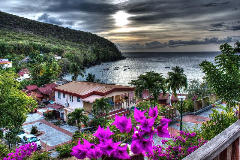 Coastal Village with Boats — Purple