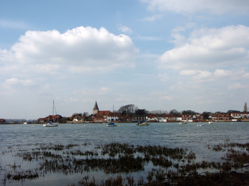 coastal village with church and boats