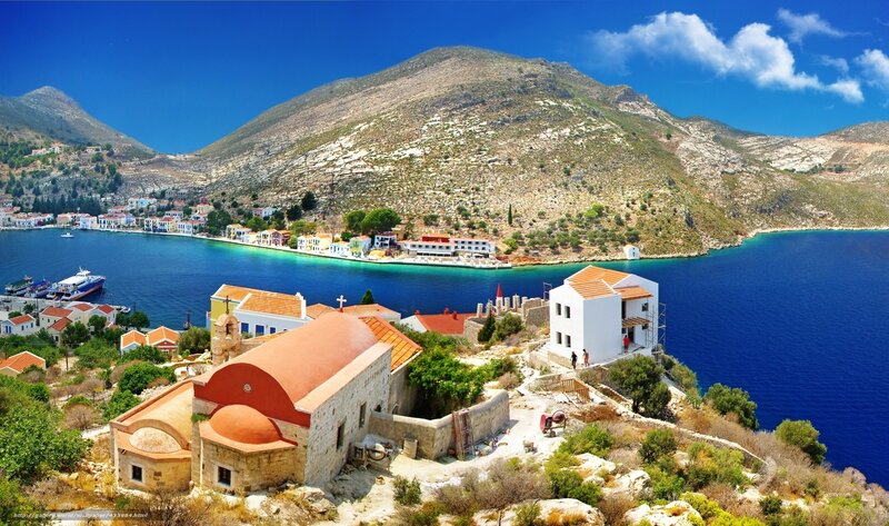 Coastal village with church and harbor