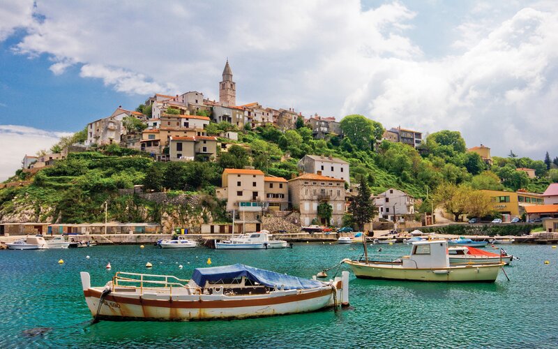 Coastal village with church tower
