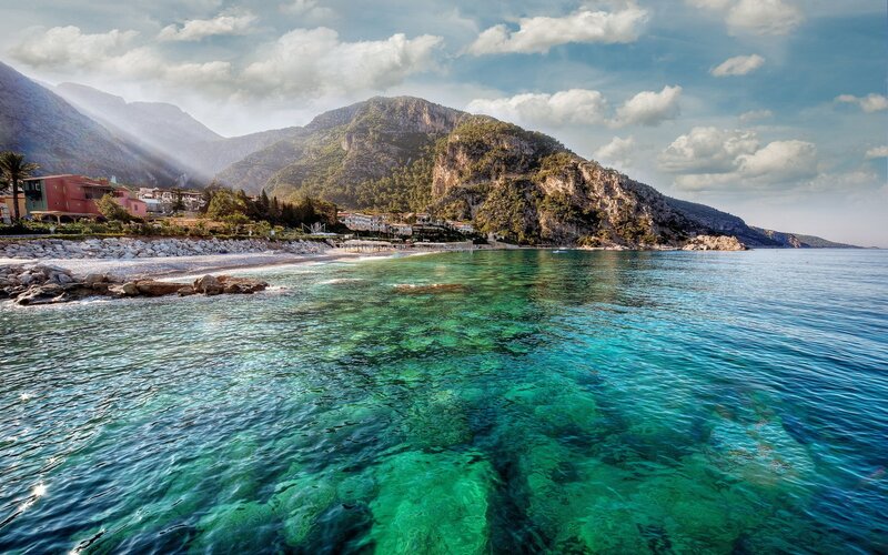 coastal village with clear turquoise water