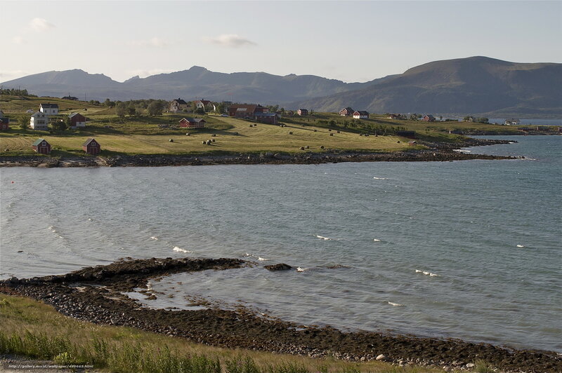 Coastal village with mountains