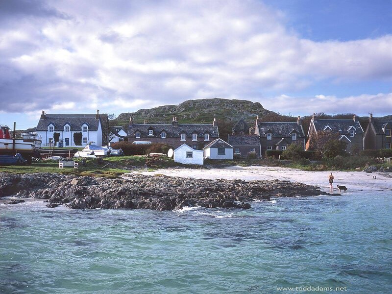Coastal village with rocky shore