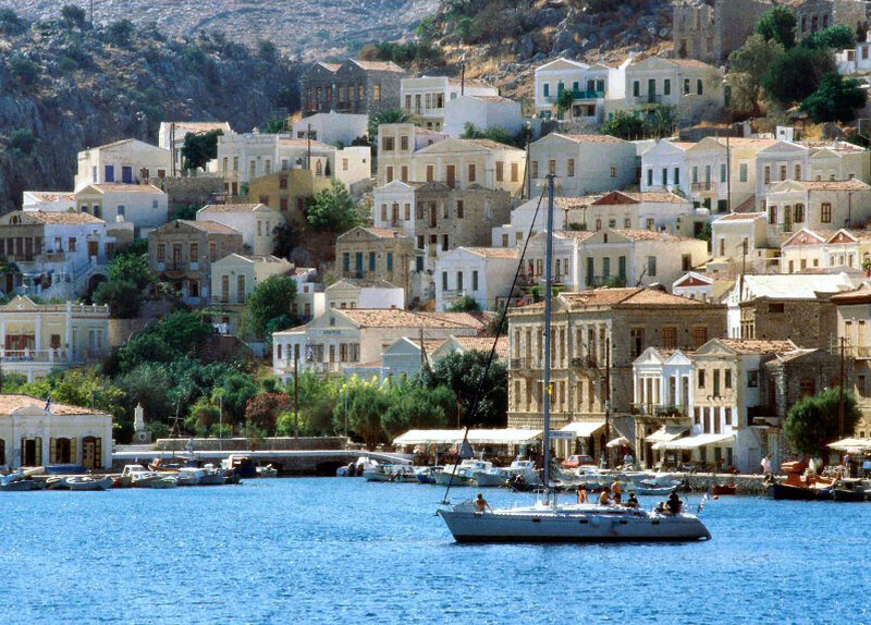 Coastal village with sailboat