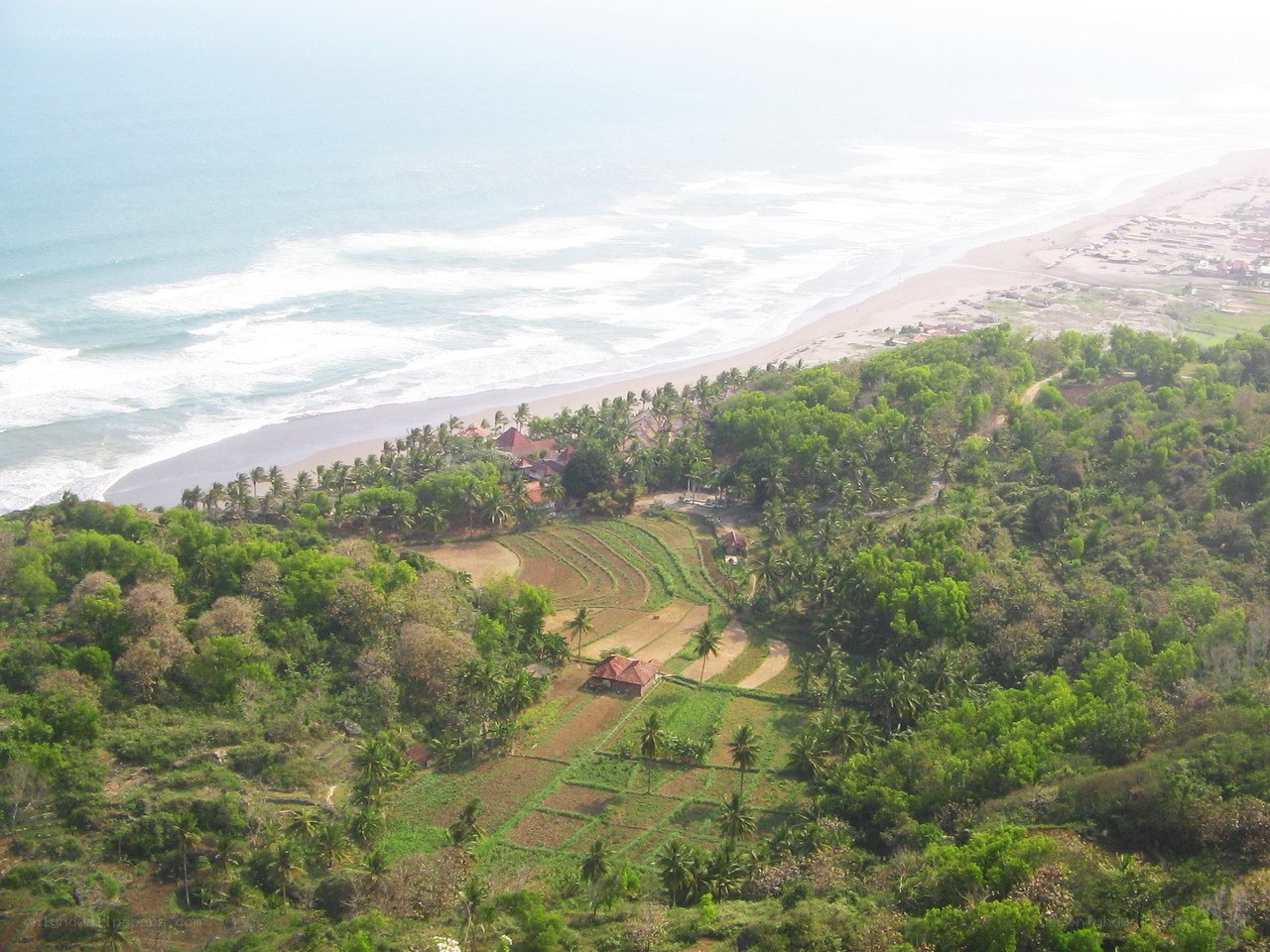 coastal village with terraced fields