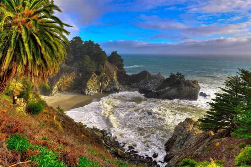 Coastal Waterfall and Beach