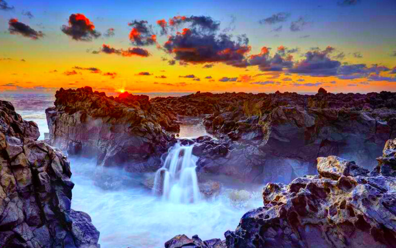 Coastal Waterfall at Sunset — Orange, Dramatic, Photograph, Rocks