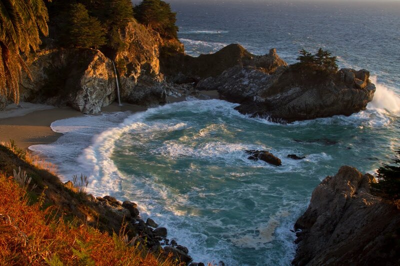 Coastal Waterfall into Ocean — Blue, Dramatic, Sunset