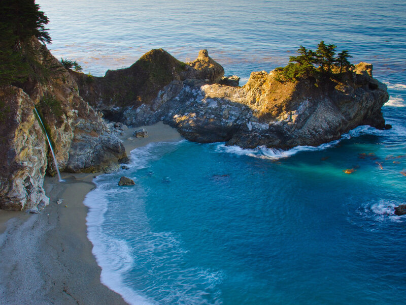 Coastal Waterfall into Ocean — Blue, Serene