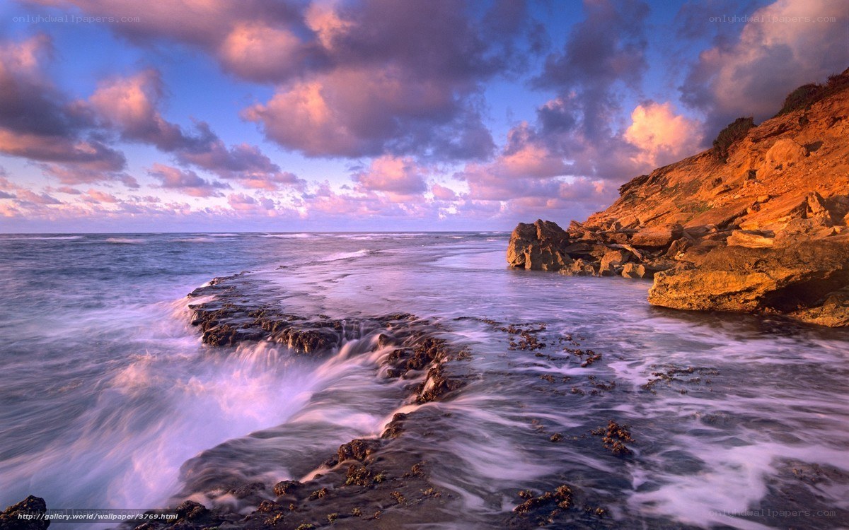 Coastal waves at sunset
