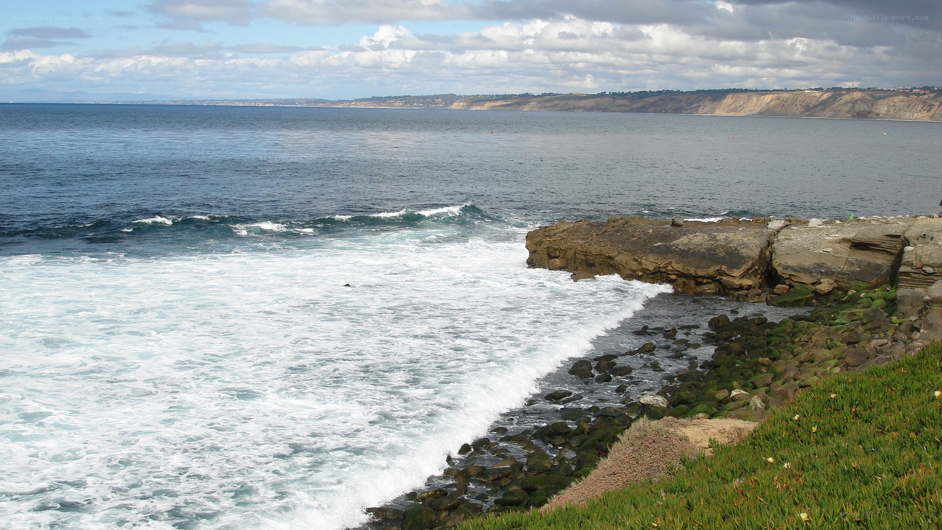 coastal waves crashing on rocks