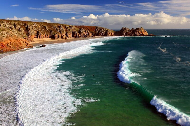 coastal waves crashing on rocky shore