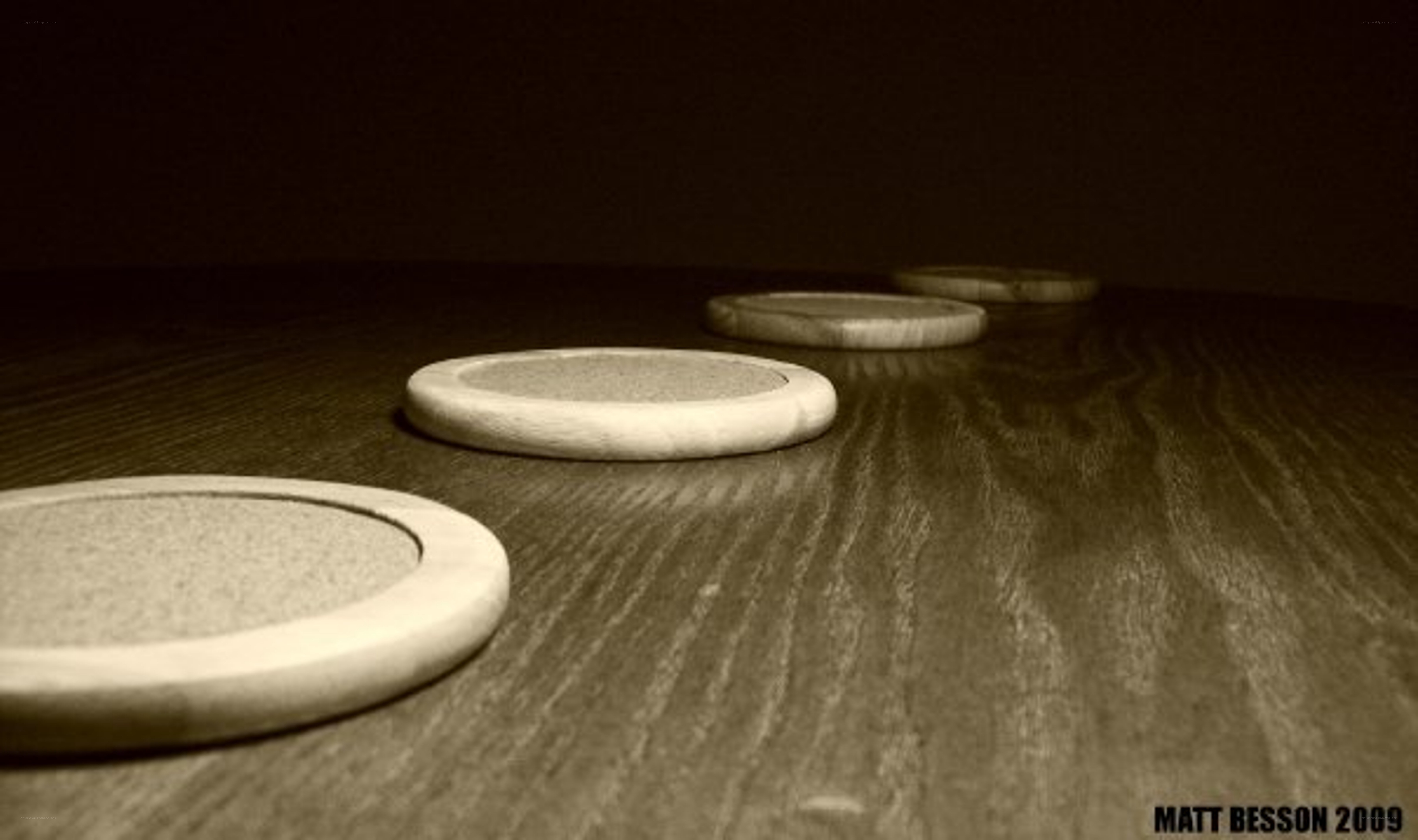 coasters on a wooden table